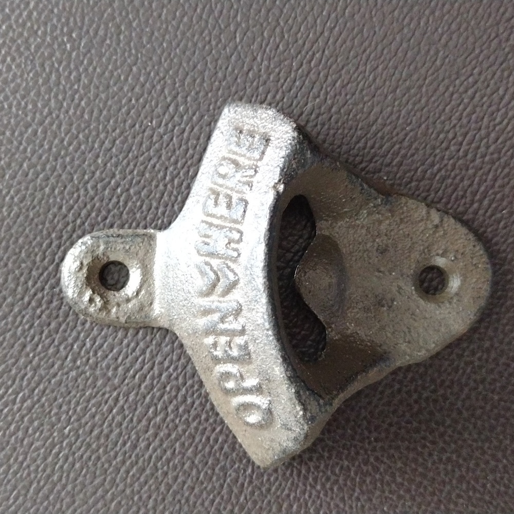 Cast iron bottle opener